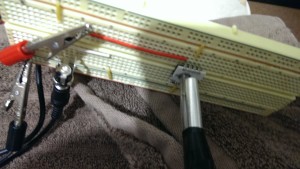 Differential pressure sensor with different length tubes attached